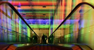 Escalator through the “Tunnel of Light” installation at the Nydalen Metro Station in Oslo, Norway (© Bard Johannessen/Getty Images) &copy; (Bing United States)