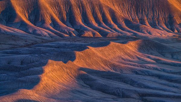 Sandstone formations in the badlands near Caineville, Utah, United States