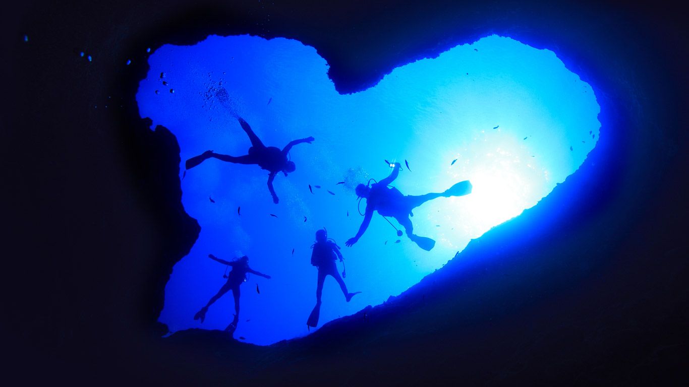 Divers at the entrance to Blue Hole in Guam