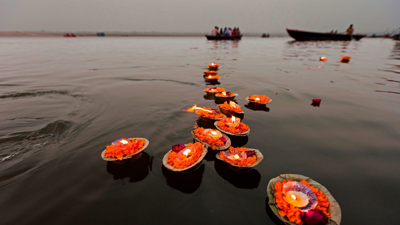 Candles floating in the Ganges, Varanasi, India