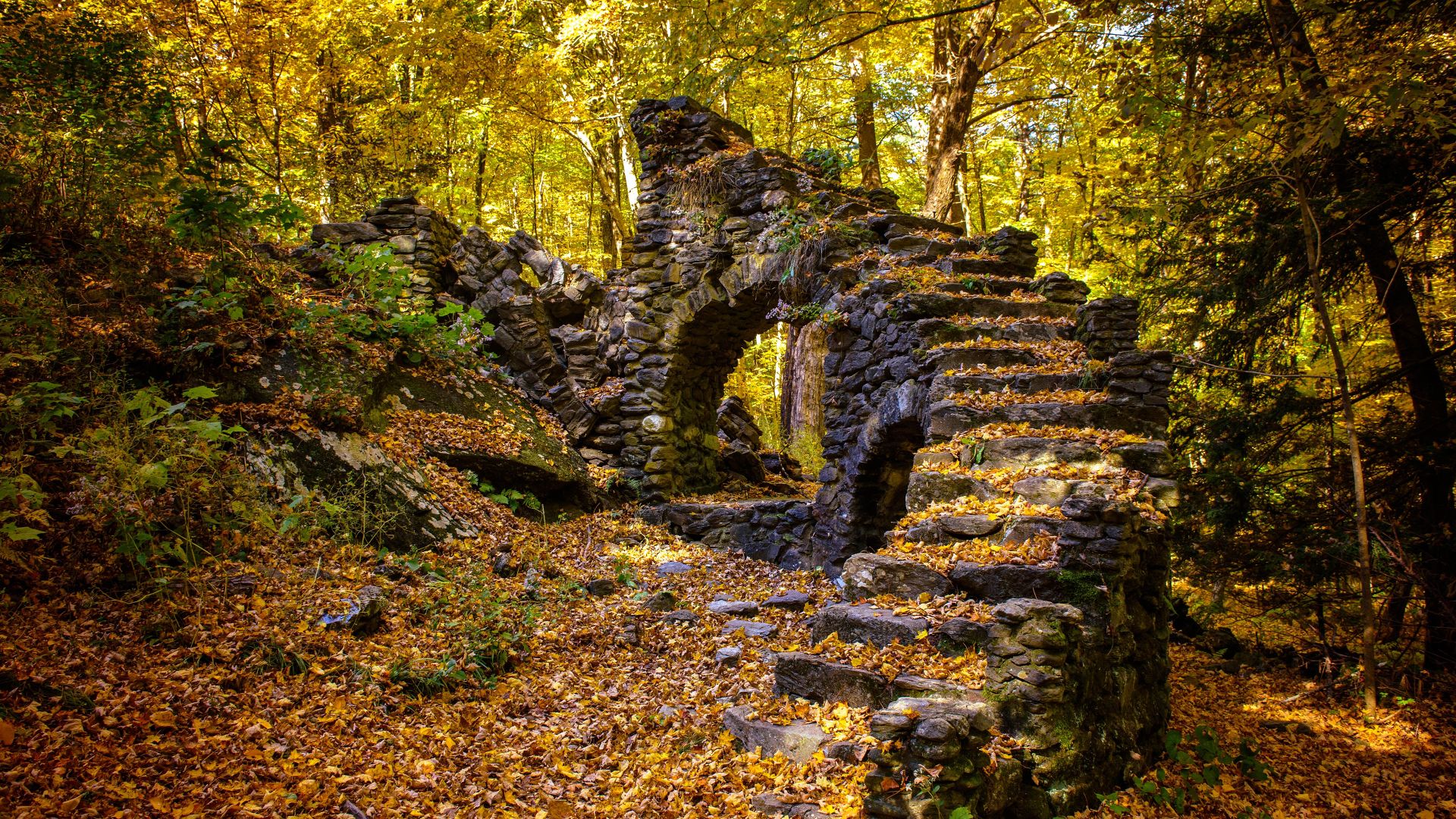 Madame Sherri Forest and the remnant of an old castle, New Hampshire, USA