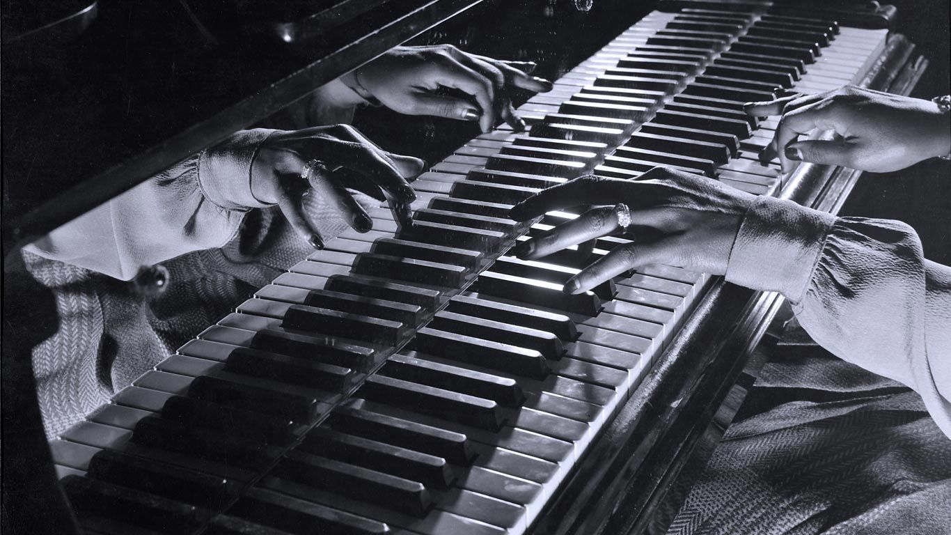 Close-up of the hands of jazz pianist Mary Lou Williams during a jam session held in New York City, USA, 1943