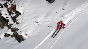 Skier dressed as Santa in Verbier, Switzerland (© Denis Balibouse/Reuters)(Bing United Kingdom)