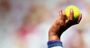 Ballboy's hand holding ball aloft, Wimbledon, England (© Exactostock / SuperStock) &copy; (Bing United Kingdom)