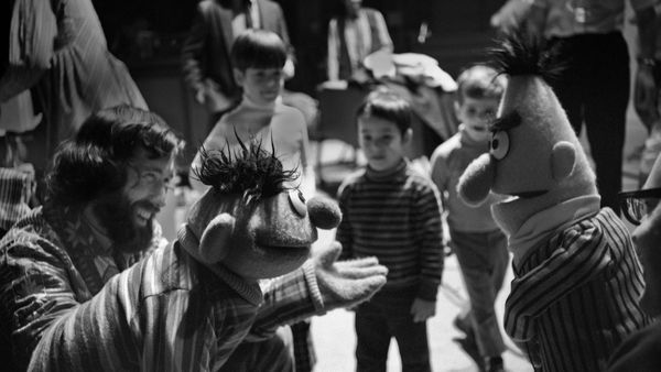 Jim Henson, along with Ernie and Bert, rehearses for an episode of \'Sesame Street\' in 1970 in New York City
