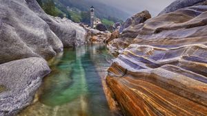 Rocks in the Verzasca River near the hamlet of Lavertezzo in the Valle Verzasca of Switzerland (© Robert Seitz/Offset by Shutterstock)(Bing United States)