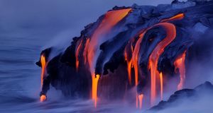 Viscous lava from Kilauea continues to pour into the ocean at Kalapana, Hawaii -- Bruce Omori/Corbis &copy; (Bing Australia)
