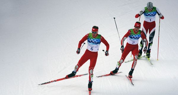 Gold medalist Bill Demong (L) and  silver medalist Johnny Spillane (C) of the United States and Austria's bronze medalist Bernhard Gruberin compete in the Men's Nordic Combined Cross Country at the Vancouver Winter Olympics on February 25, 2010