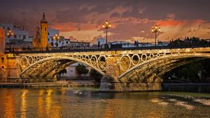 Seville, Spain’s Guadalquivir River and Triana Bridge for the 500th anniversary of Magellan’s departure (© Zu Sanchez Photography/Getty Images)(Bing United States)