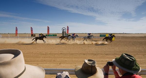 Crowd watching Birdsville Cup horse race, Birdsville, Queensland, Australia