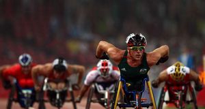 Kurt Fearnley of Australia competes in the Men's 5000m - T54 Heat 1 at the National Stadium during day two of the 2008 Paralympic Games September 8, 2008 in Beijing, China (© Chris Hyde/Getty Images) &copy; (Bing Australia)