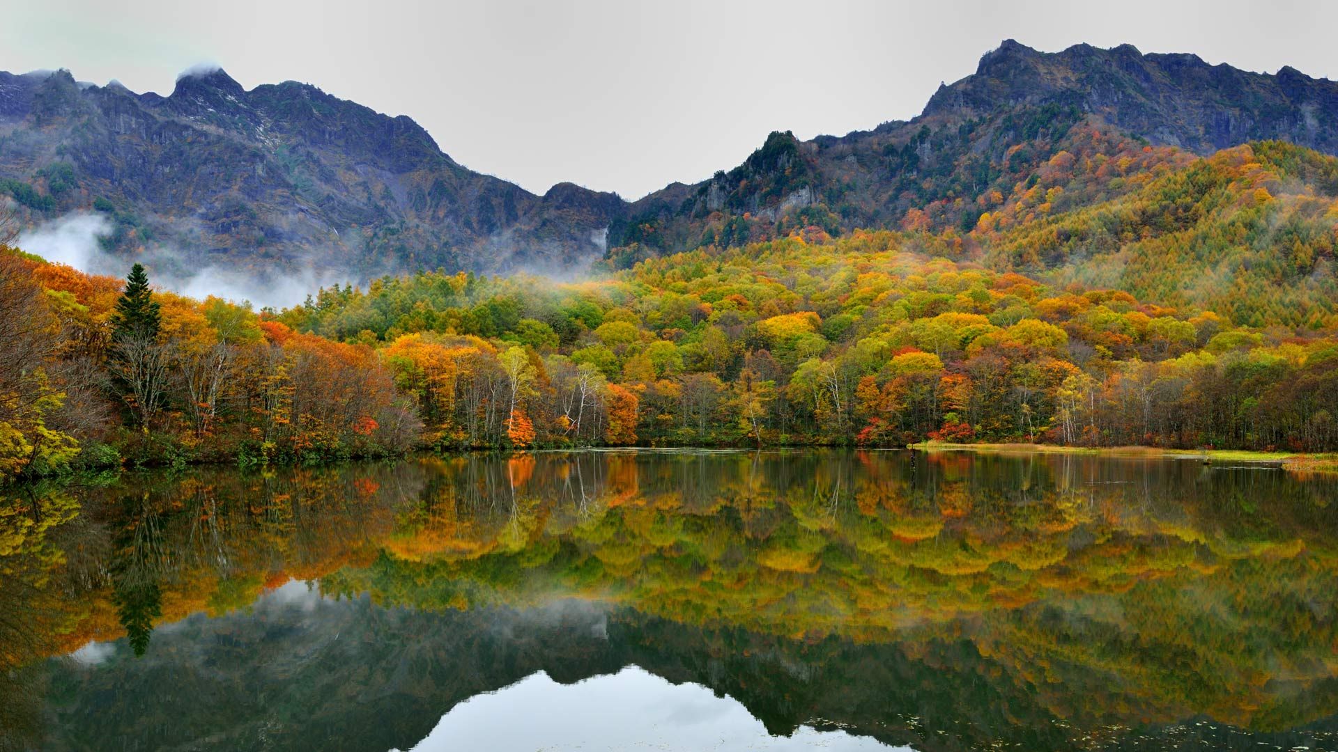 Autumn colors reflected in Mirror Pond (Kagami-ike), Nagano, Japan