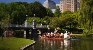 Swan boats at the Lagoon Bridge in the Boston Public Gardens, Boston, Massachusetts, USA -- Amanda Hall/Corbis &copy; (Bing Australia)