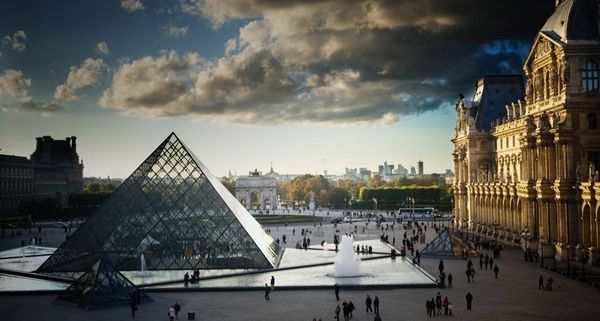 Louvre museum and pyramids in Paris, France