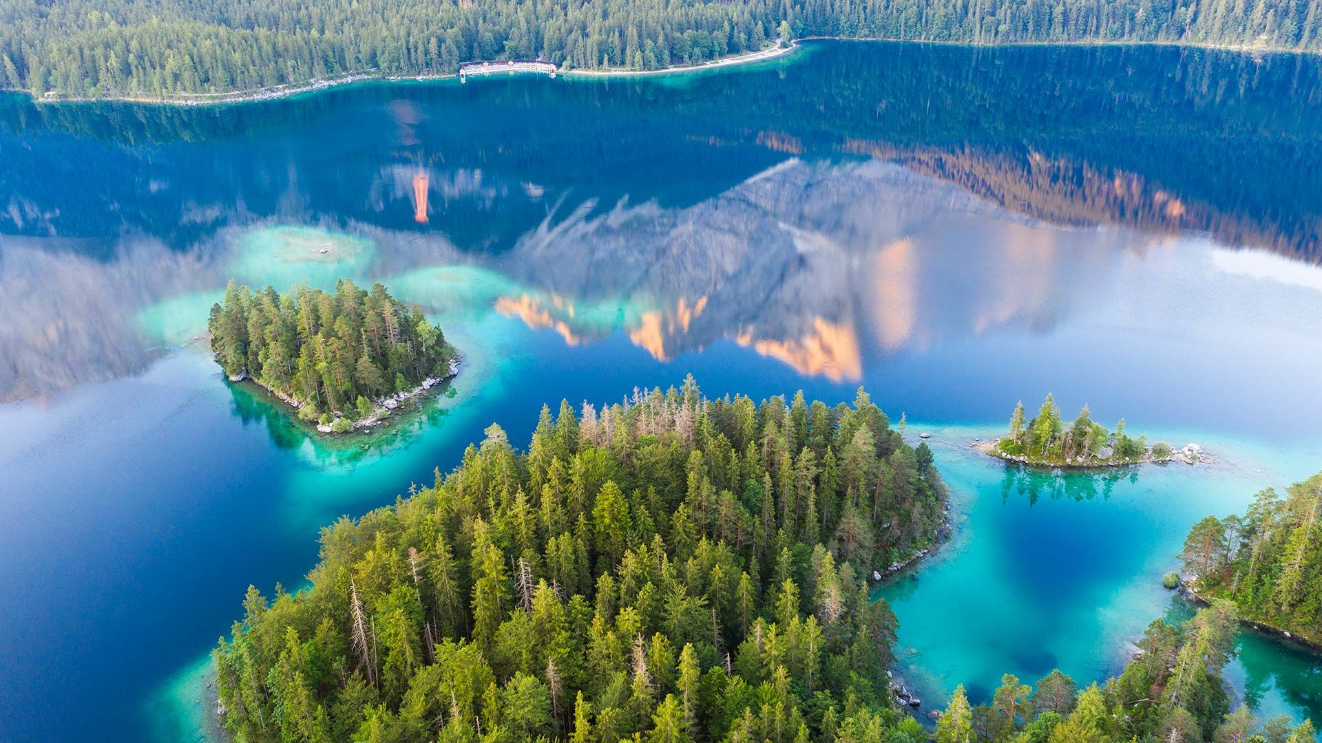 The Zugspitze mountain reflecting in Eibsee lake, Bavaria, Germany