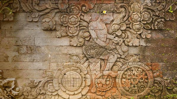 A carving of artist W.O.J. Nieuwenkamp at the Pura Meduwe Karang temple in Bali, Indonesia