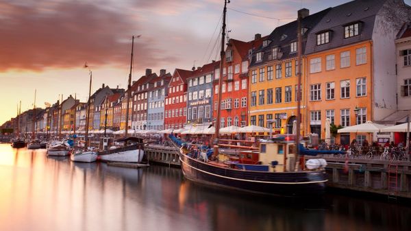 Colorful homes line Nyhavn Canal in Copenhagen, Denmark