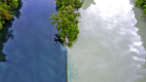 The Arve River (right) flowing into the Rhône in Geneva, Switzerland