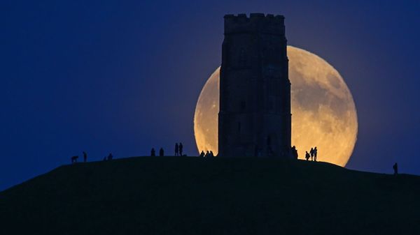 The Moon rises over Glastonbury Tor, Somerset