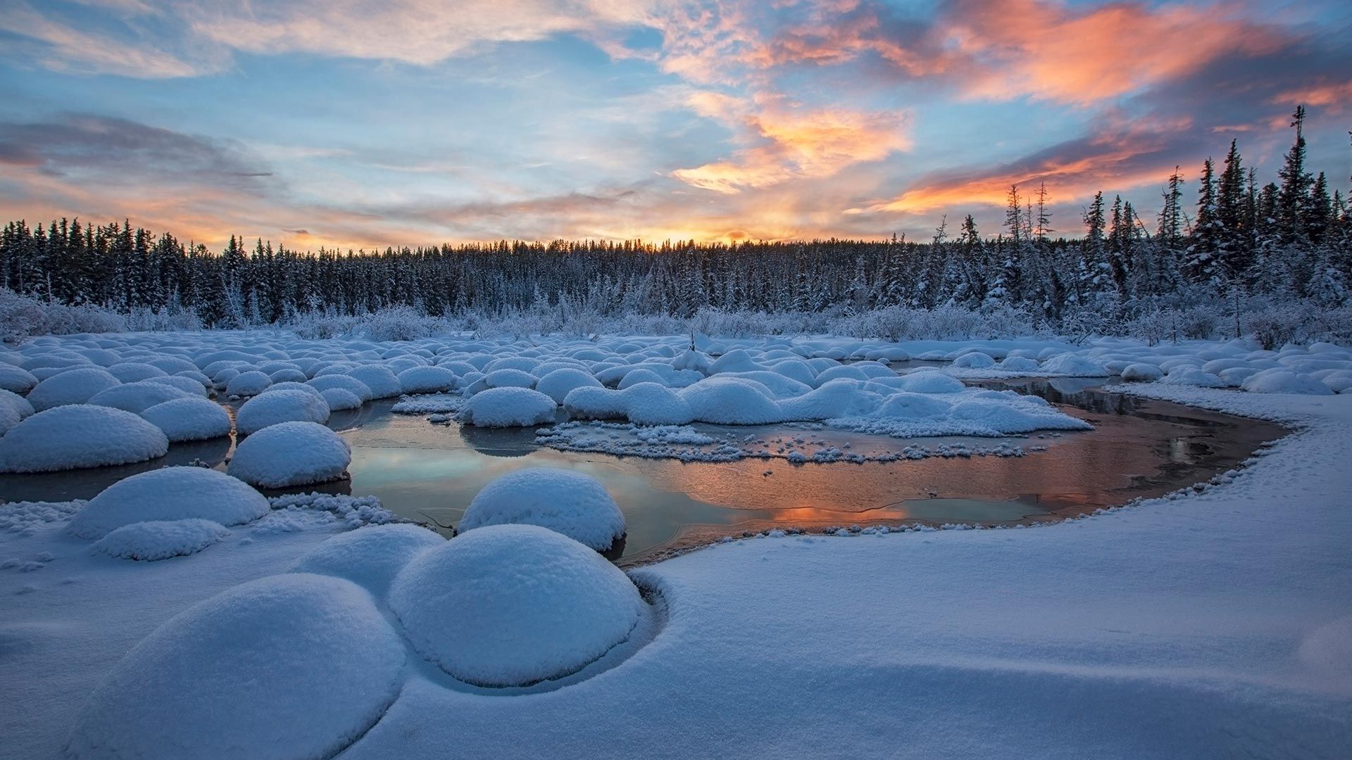 Red clouds at sunset over McIntyre Creek in Whitehorse, Yukon