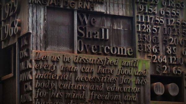 MLK memorial sculpture by William Tarr outside of Martin Luther King Jr. Educational Campus in New York City