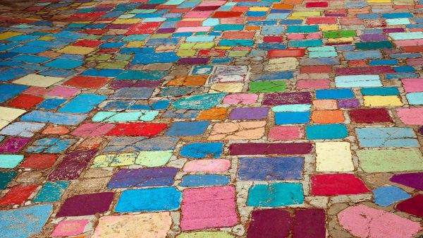 Multicolored cobblestones in the Spanish Village Art Center in Balboa Park, San Diego, California, USA