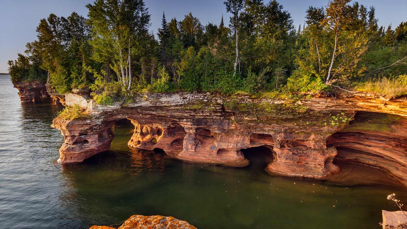 Layered sandstone cliffs and sea caves on Devils Island in the Apostle Islands National Lakeshore, Wisconsin
