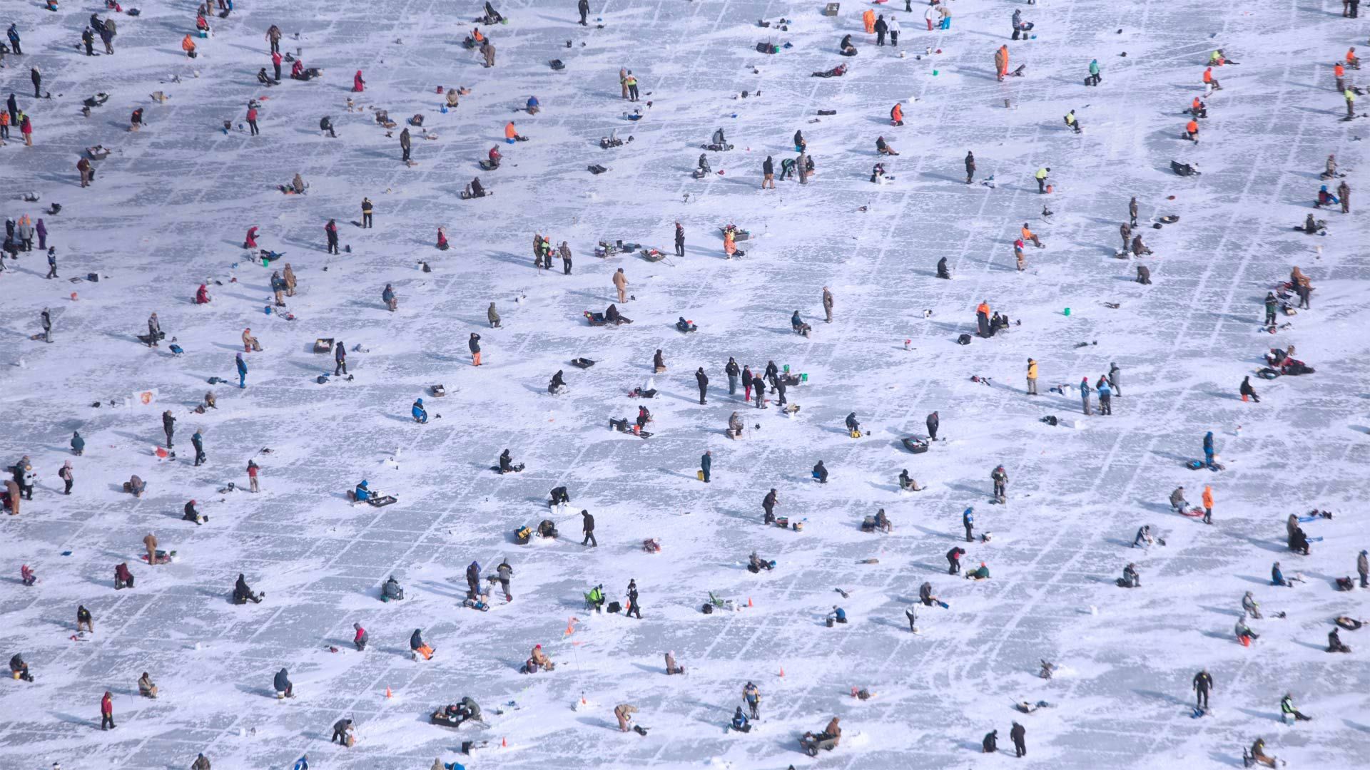 People ice fishing on Gull Lake in Brainerd, Minnesota, USA