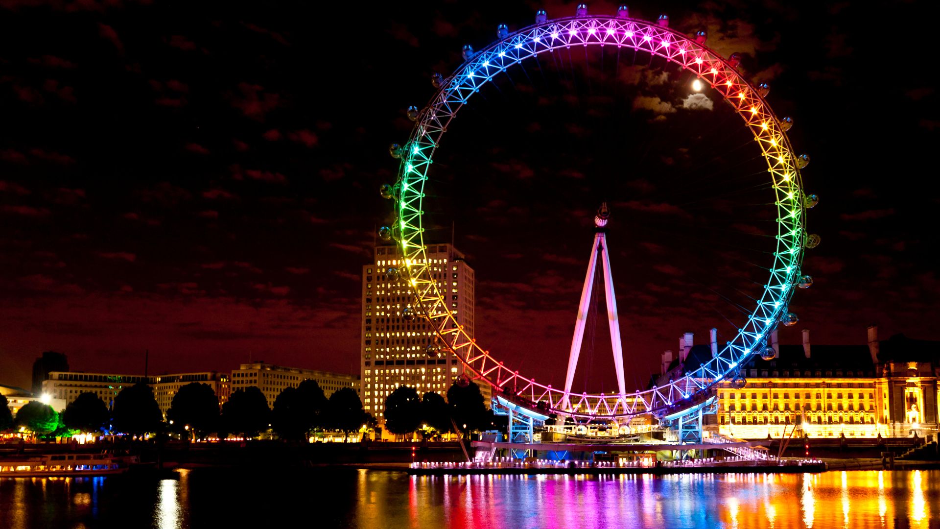 London Eye lit up with the rainbow colours during Pride Night