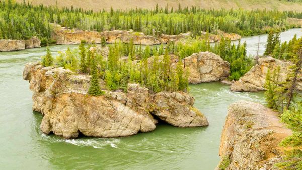 Treacherous Rock islands of Five Finger Rapids in Yukon River near town of Carmacks, Yukon Territory, Canada