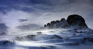 Haytor Rocks after a heavy snow fall, spin drift carried across the ground by strong winds, Dartmoor, Devon, England --  David Clapp/Photolibrary &copy; (Bing United Kingdom)