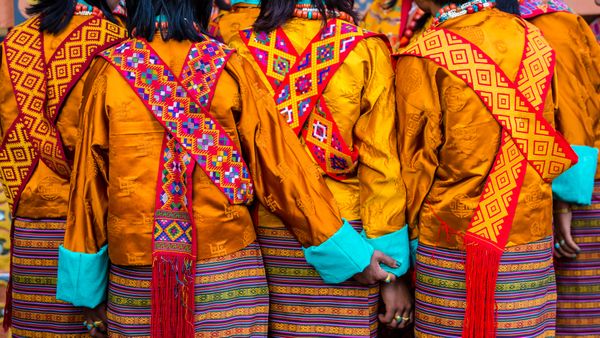 Women in traditional dress at the Paro Tshechu Festival in Bhutan
