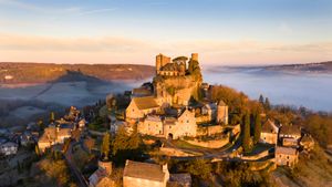 The hilltop village of Turenne at sunrise in the Corrèze department, Nouvelle-Aquitaine, France (© Tim Mannakee/plainpicture)(Bing United Kingdom)