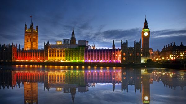 The Palace of Westminster illuminated in rainbow colours for Pride in London in 2017