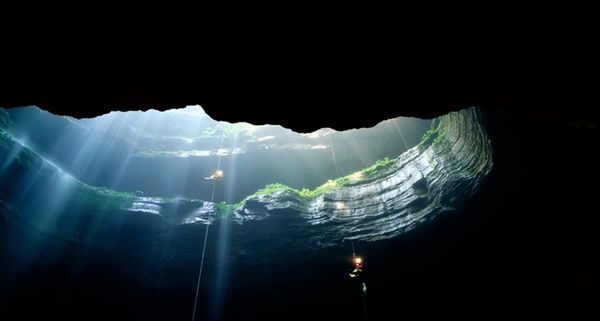People spelunking in Neversink Pit, Jackson County, Alabama