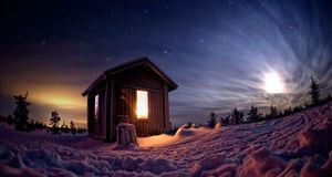 Mountain hut in wilderness with stars and moon at night during winter, Finland (© ajliikala/Getty Images) &copy; (Bing United Kingdom)