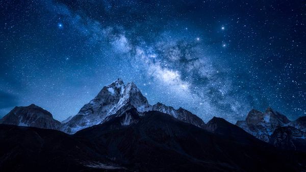 Milky Way over the Himalayan peak Ama Dablam in Nepal