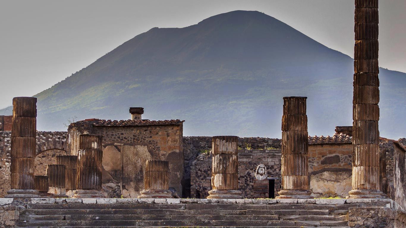 The Temple of Jupiter and Mount Vesuvius from Pompeii, Italy