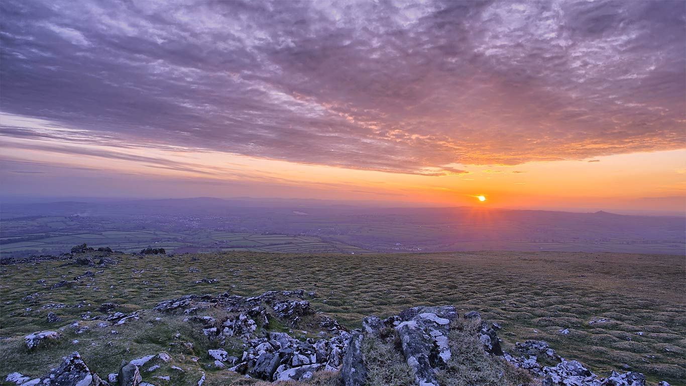 Sun setting in Dartmoor National Park, Devon, England
