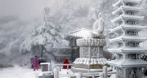 Snow blankets a temple on a mountain in South Korea's eastern Gangwon Province -- YONHAP/Corbis &copy; (Bing United States)