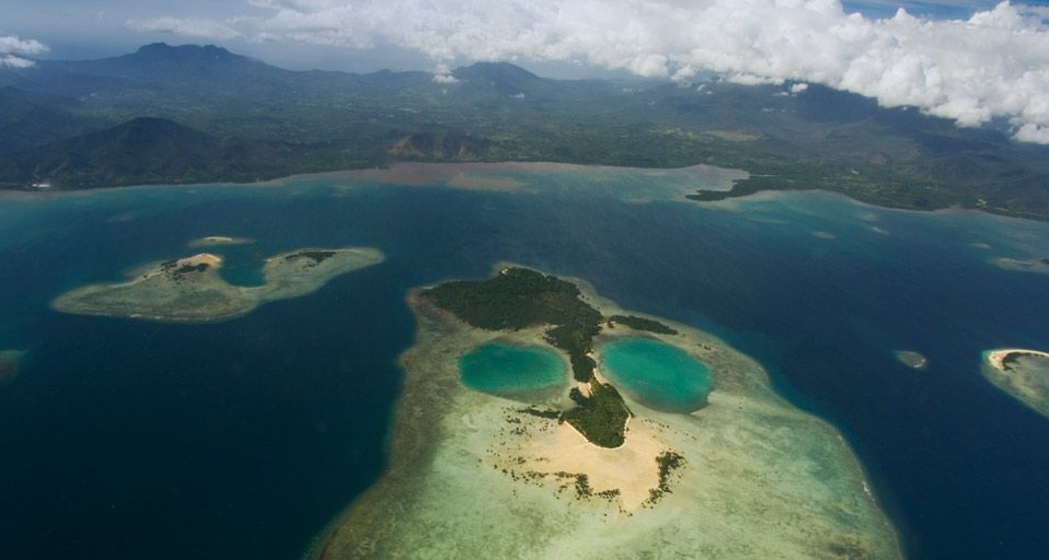 Coral island in the shape of a face near Puerto Princesa, Palawan Province, Philippines
