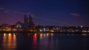 '0 Degrees,' laser art by Peter Fink and Anne Bean, in Greenwich, England (© Norah Saudan/Getty)(Bing United States)
