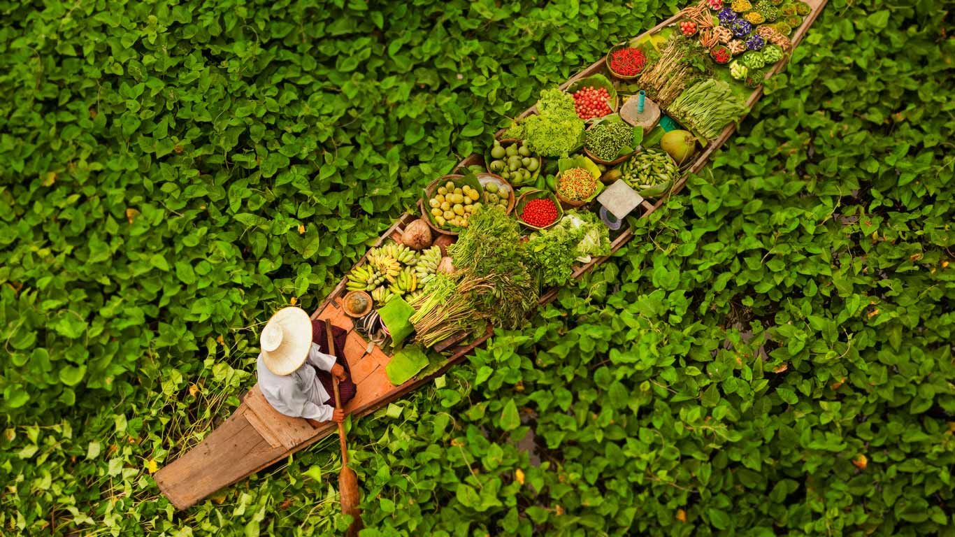 Floating market vendor near Bangkok, Thailand