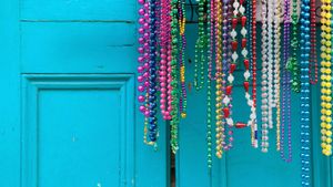 Mardi Gras beads in New Orleans, Louisiana (© David H. Lewis/Getty Images)(Bing Australia)