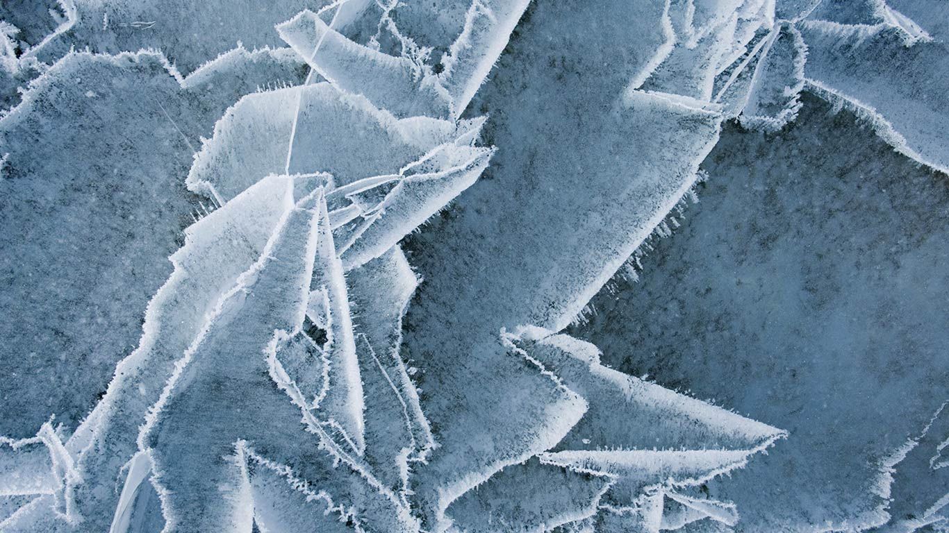 Abstract patterns in the wind polished ice of Abraham Lake, Alberta
