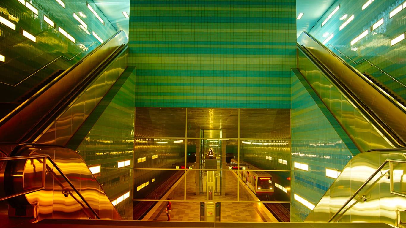 People boarding trains at Überseequartier station in HafenCity, Hamburg, Germany