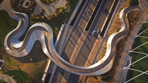 Frank Gehry\'s BP Pedestrian Bridge connecting Millennium Park and Maggie Daley Park in Chicago